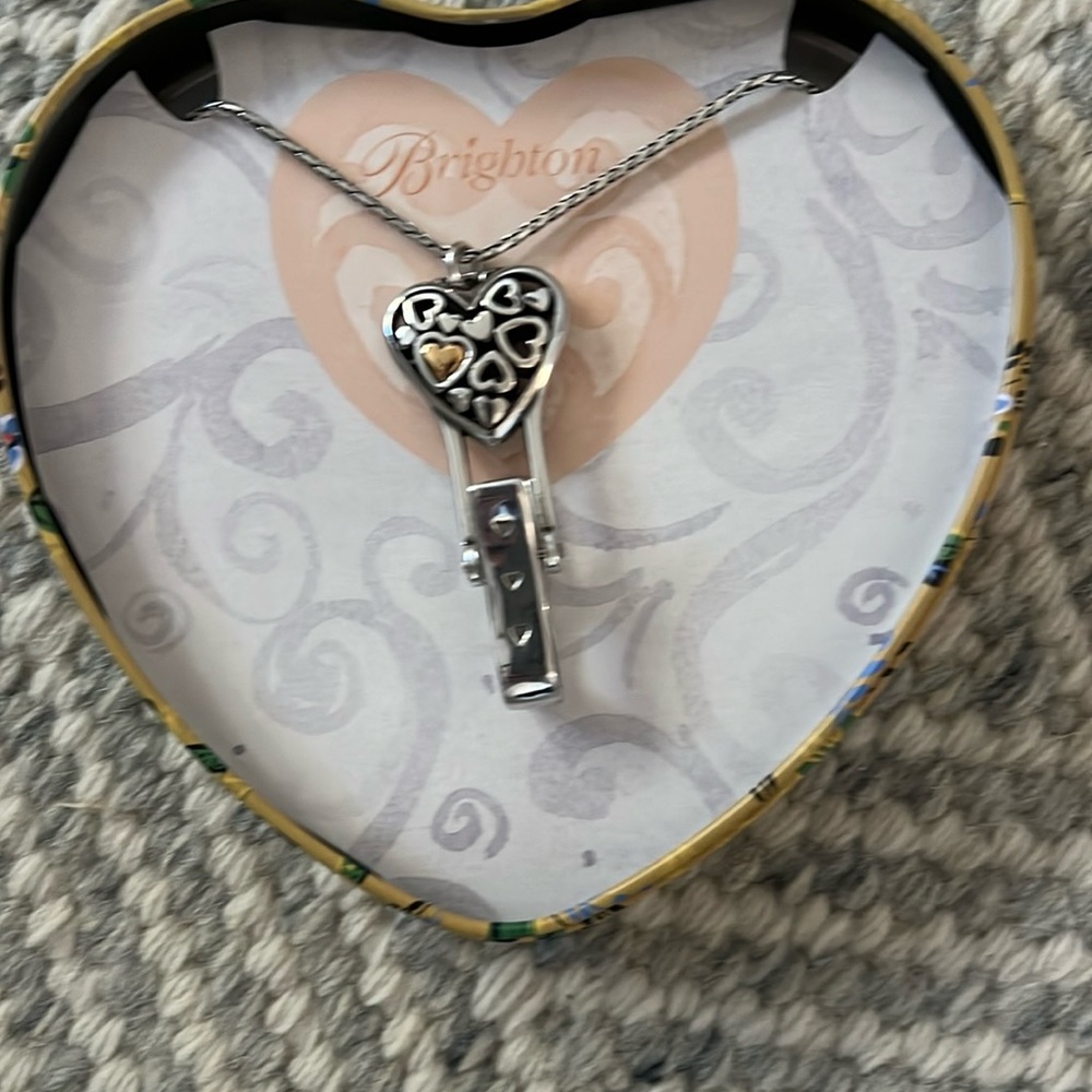 Brighton lanyard. New with original metal heart shaped box.